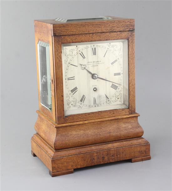 John Walker of London. A Victorian oak cased mantel timepiece, 13in.